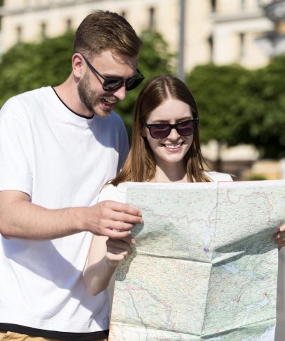 front-view-tourist-couple-looking-map